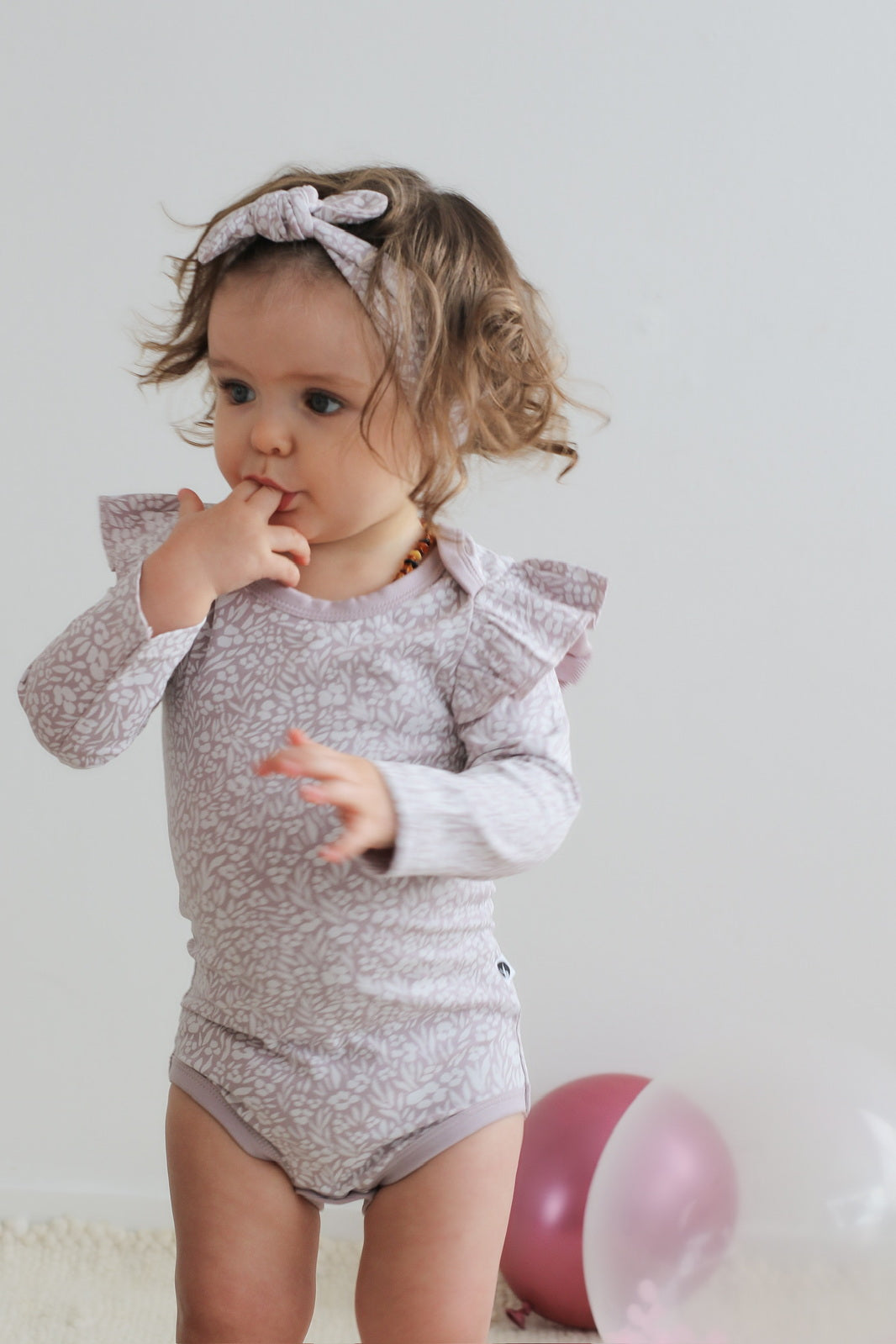 Floria Flutter Long Sleeve Bodysuit | Burrow & Be