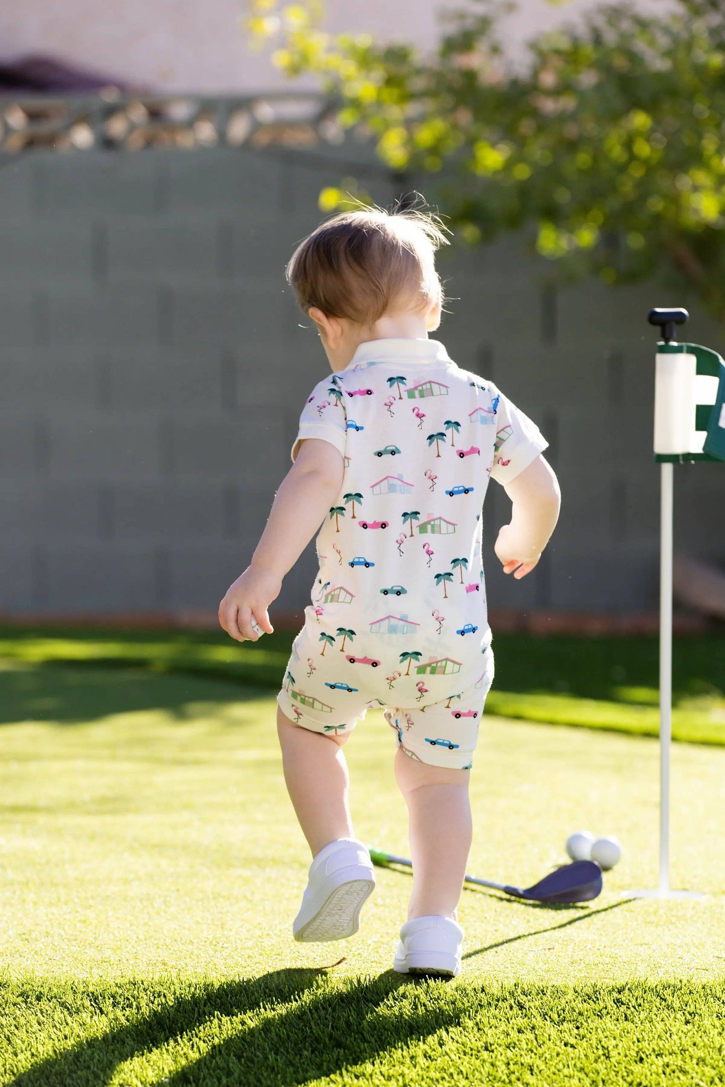 Retro Palm Springs Shorty Polo Romper | Monica + Andy